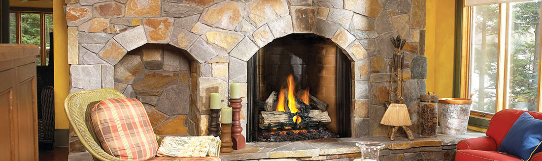 Traditional Gas Log Set in a stone fireplace