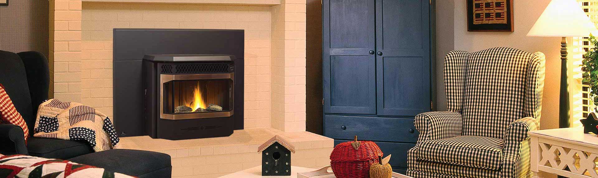 Traditional black and stainless Pellet Insert with beige brick surround and mantle